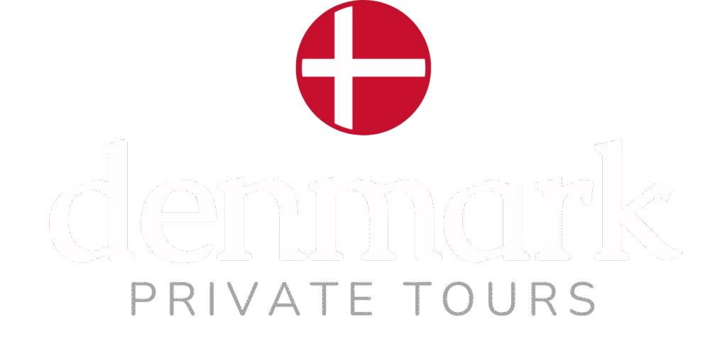 Logo of Denmark Private Tours featuring a red circle with a white cross next to stylized white text on a black background, promoting tourism services.